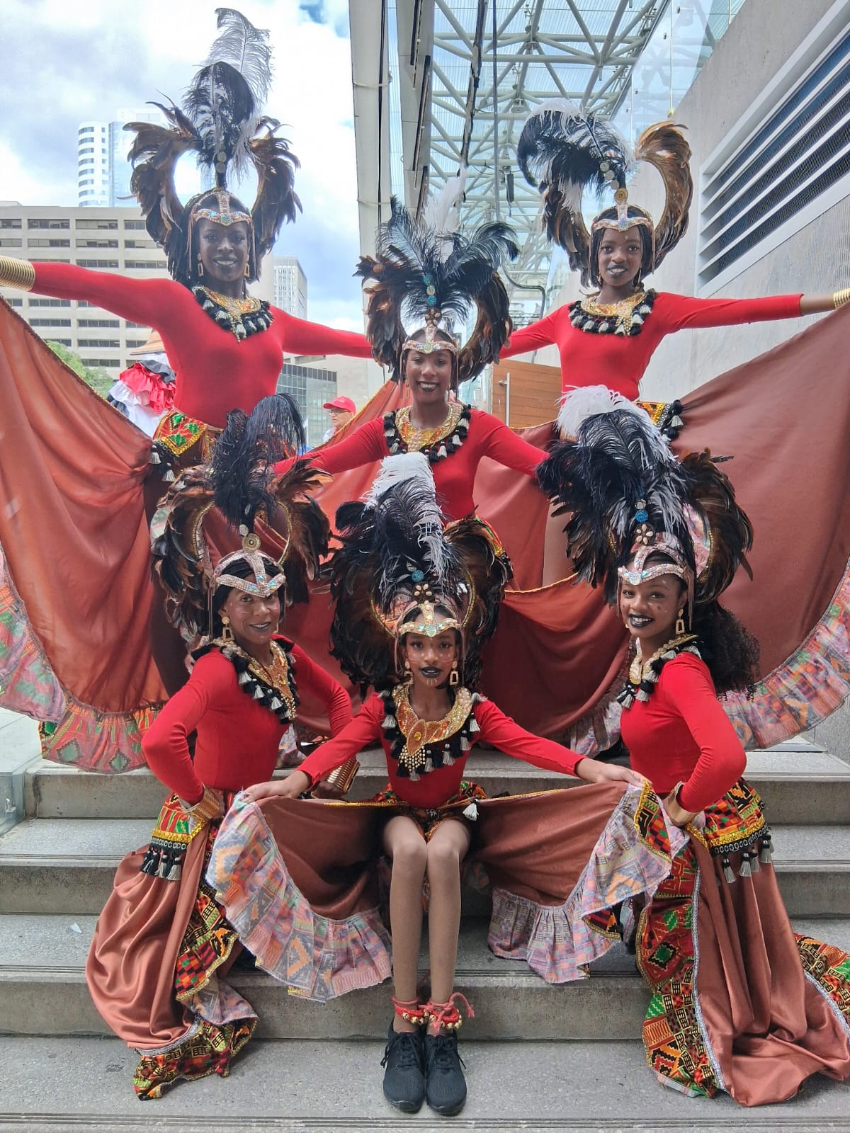 A group photo of Caribbean Winterfest performers, Dance Caribe Performing Company, post-performance in Toronto.