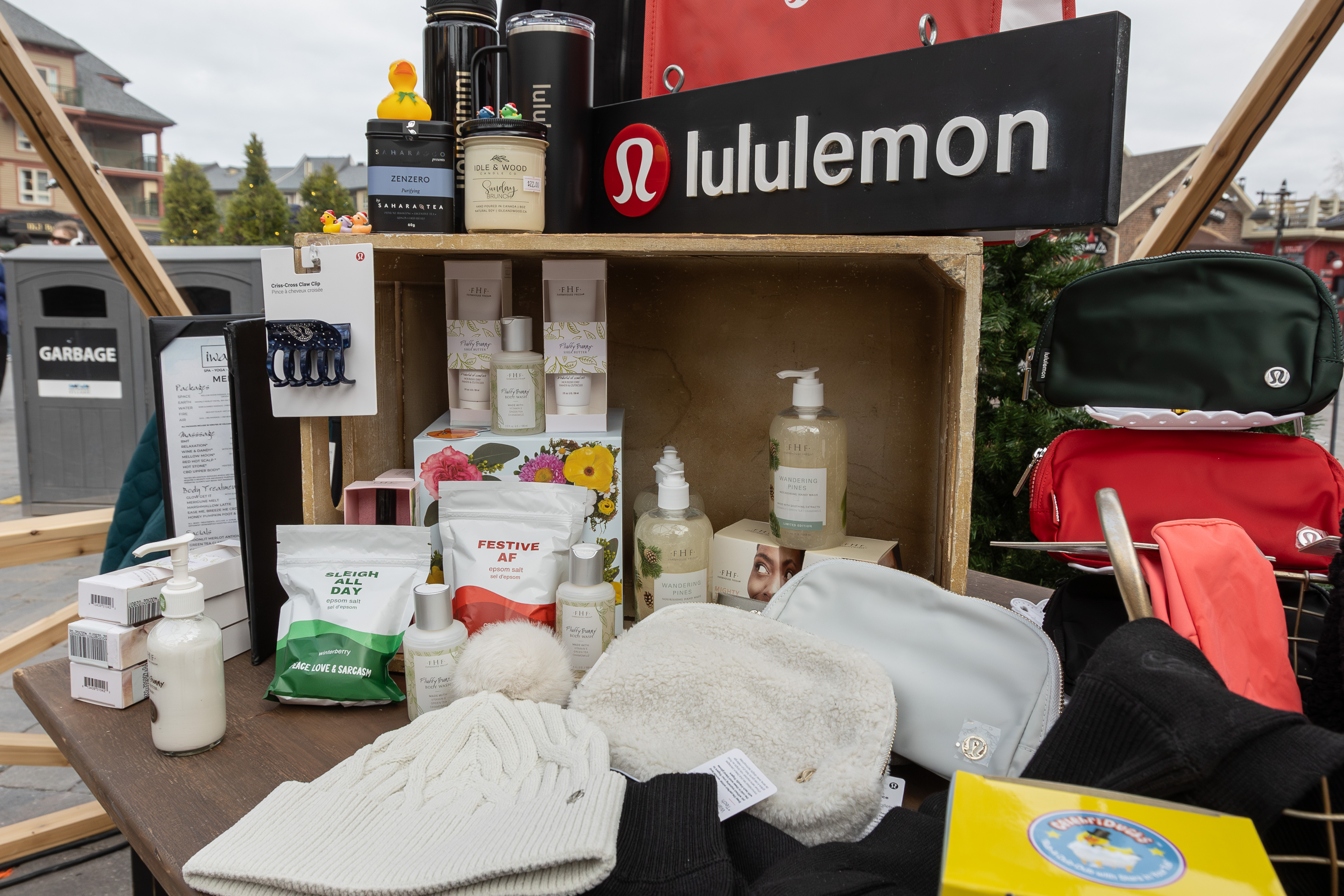 A spread of retail goods, including Lululemon wear, beauty products, and wellness products, provided by iwa Spa Boutique and Beauty Bar by iwa at their Snowdome Cocktail Garden Retail Pop Up.