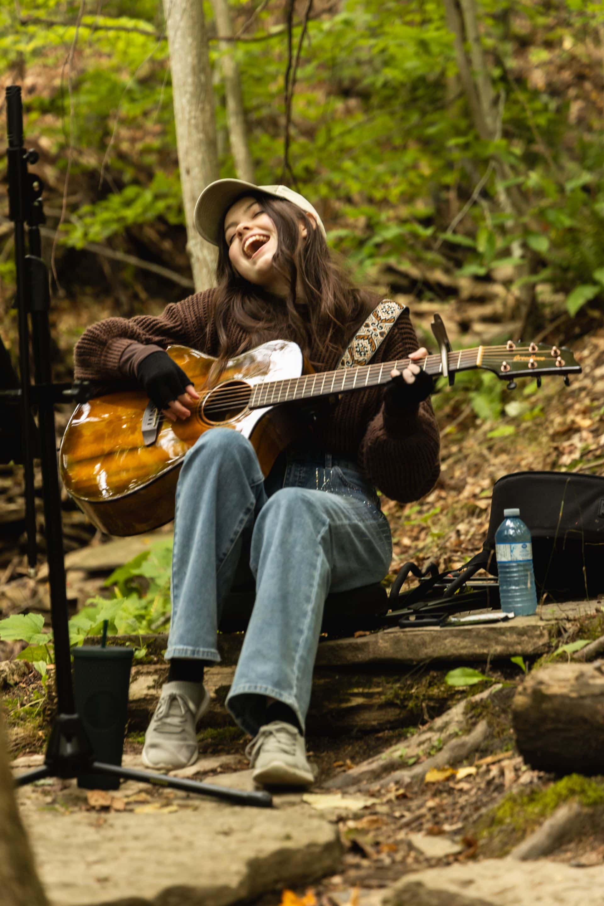 Kendall Lily performing a live acoustic set amongst the trees at one of the Mountain stops along Canada's only Guitar Trail.