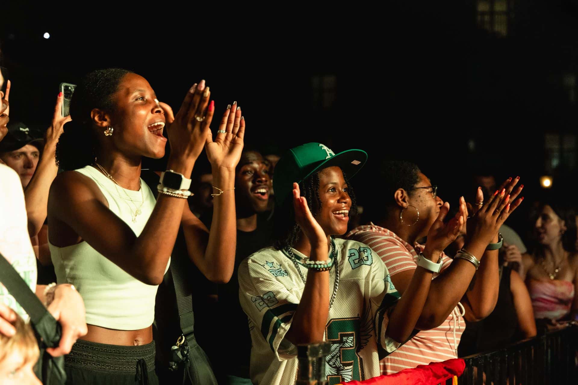 Lively audience cheering and clapping along to Reggae on the Mountain Headliner, Kirk Diamond