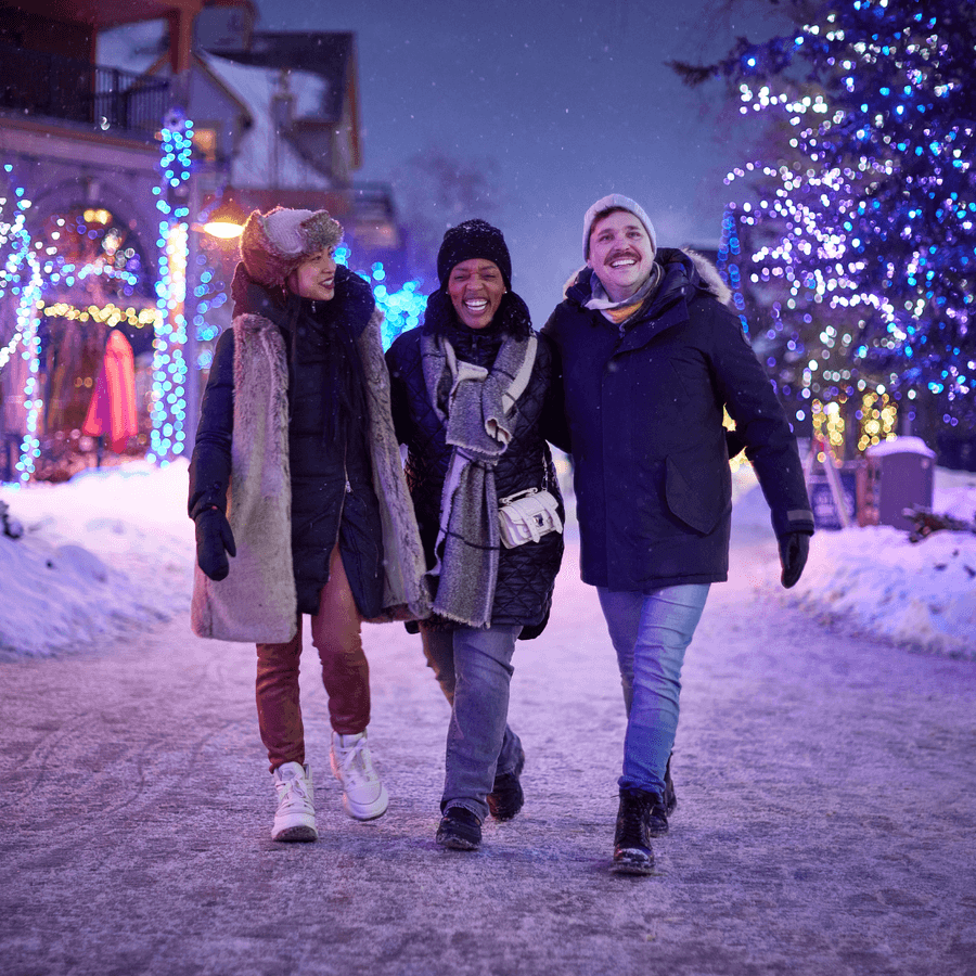 Friends walking around Blue at Night