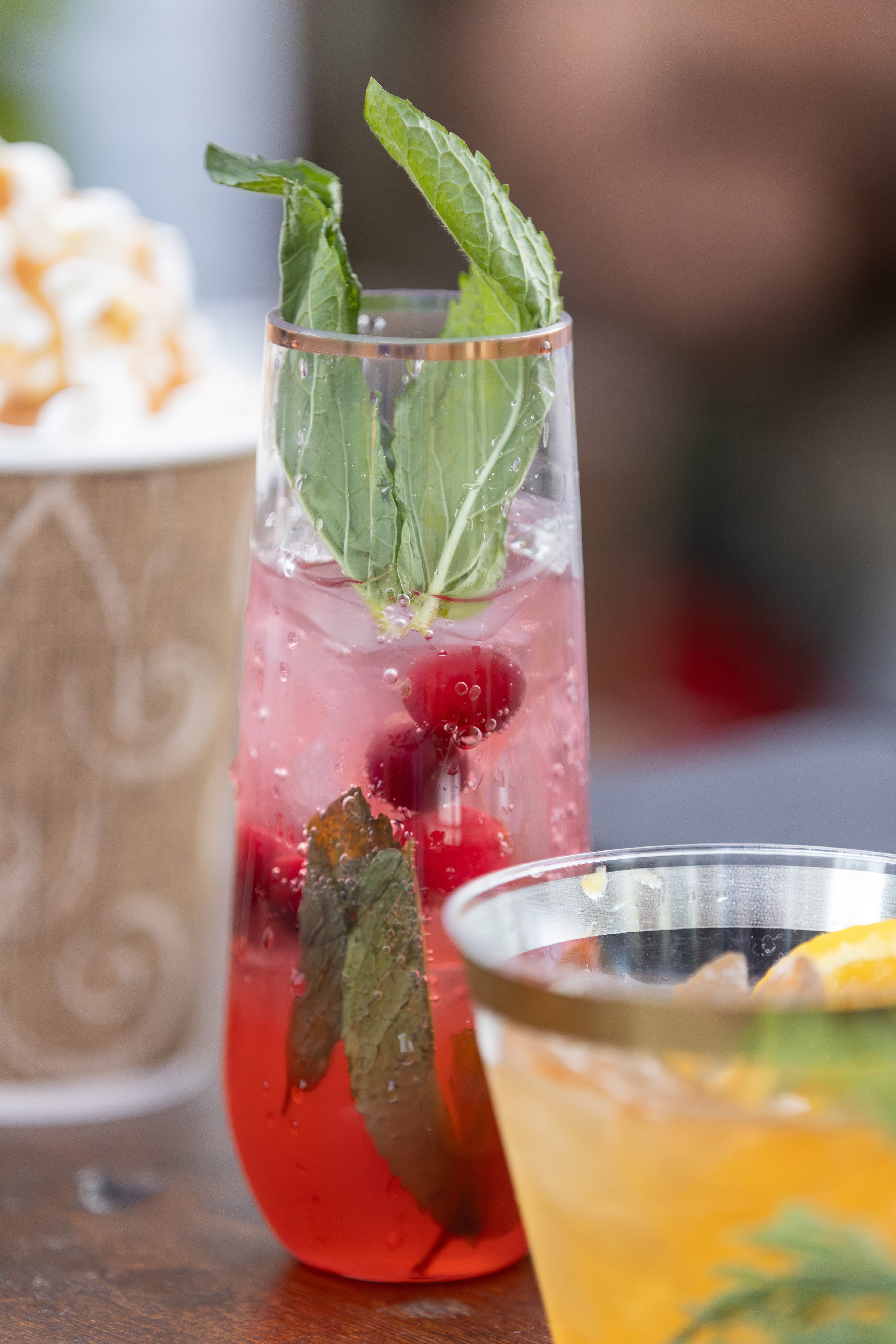 Closeup shot of festive holiday cocktails served at the Snowdome Cocktail Garden