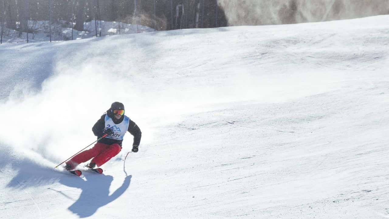 A participant skiing down the mountain.
