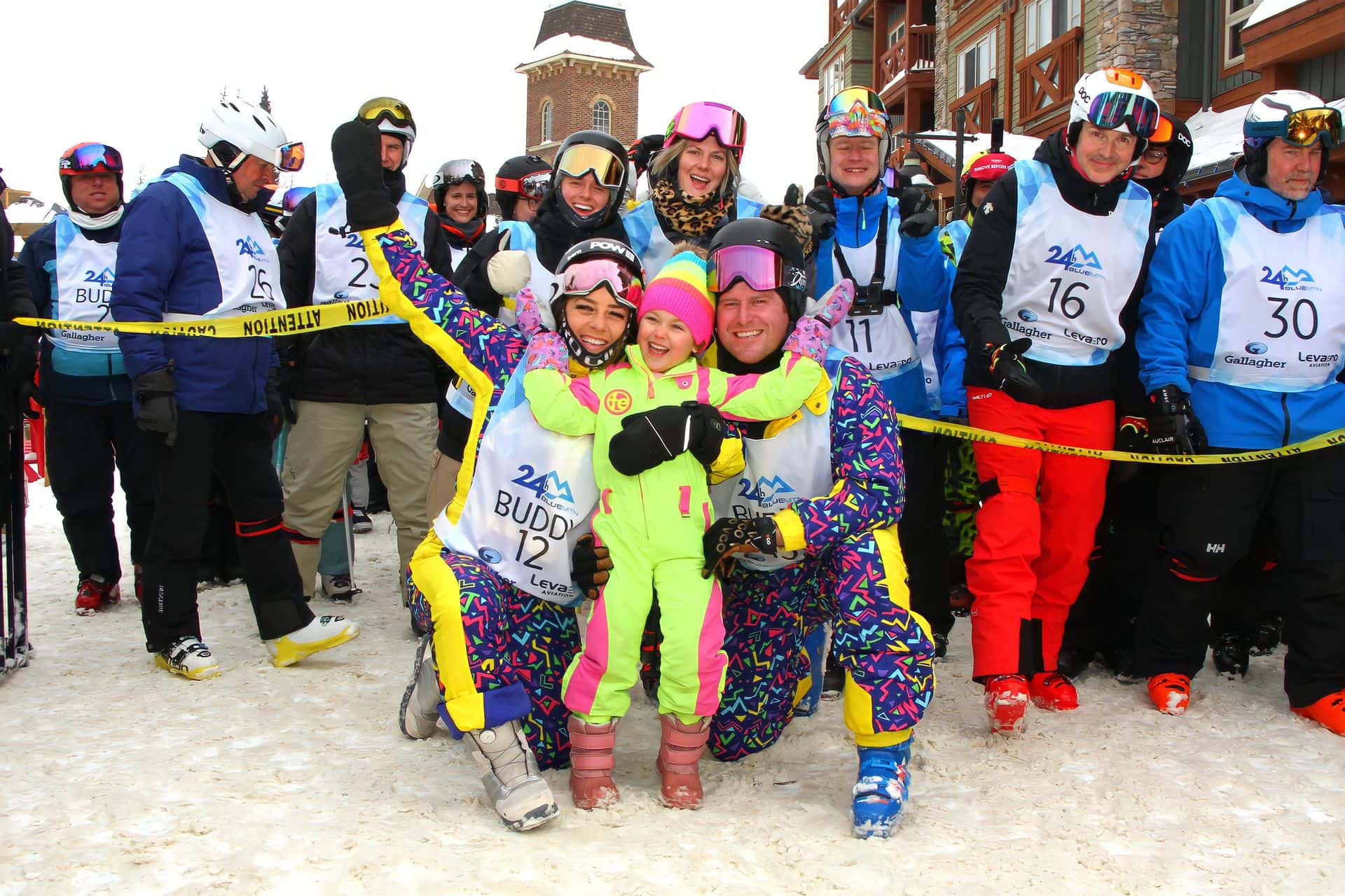 Parents celebrating at the 24h Blue Mtn finish line with their daughter.