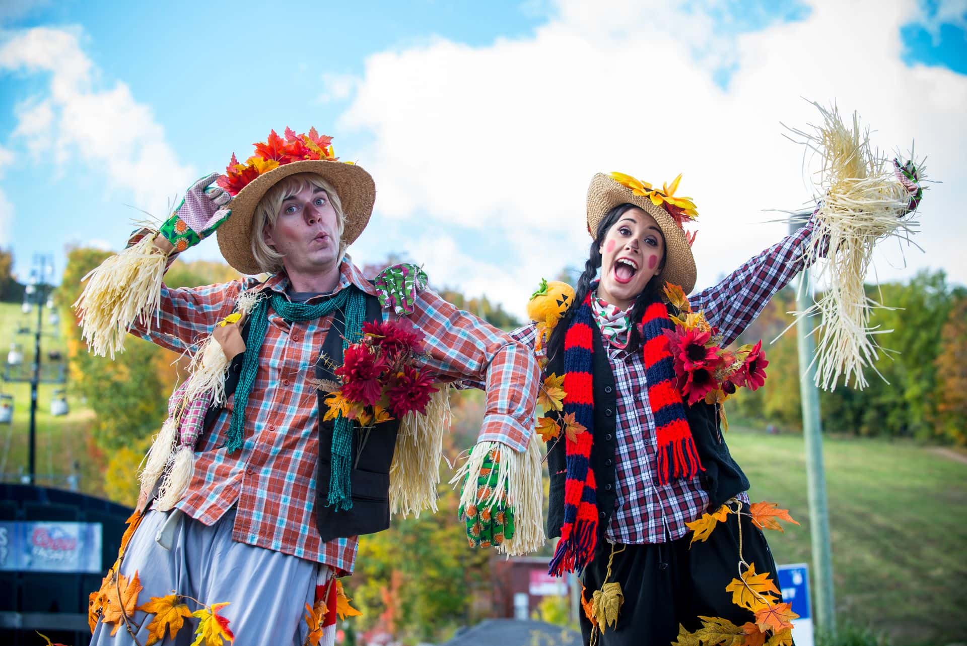 Two performers pose for a shot at Apple Harvest Festival.