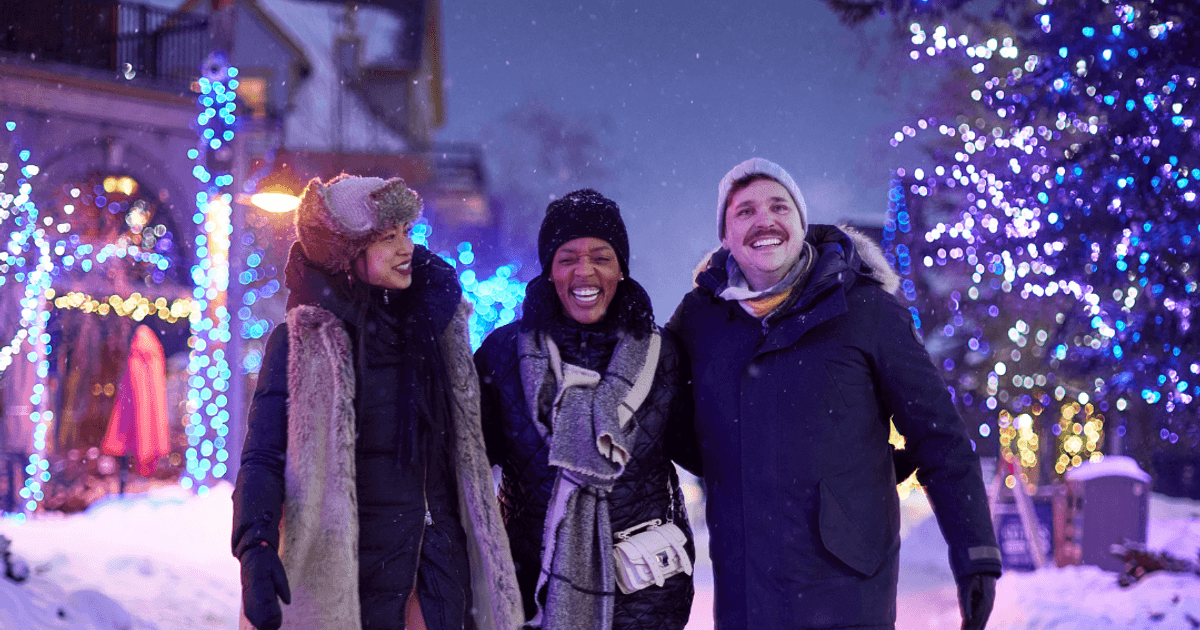 Friends walking around Blue at Night