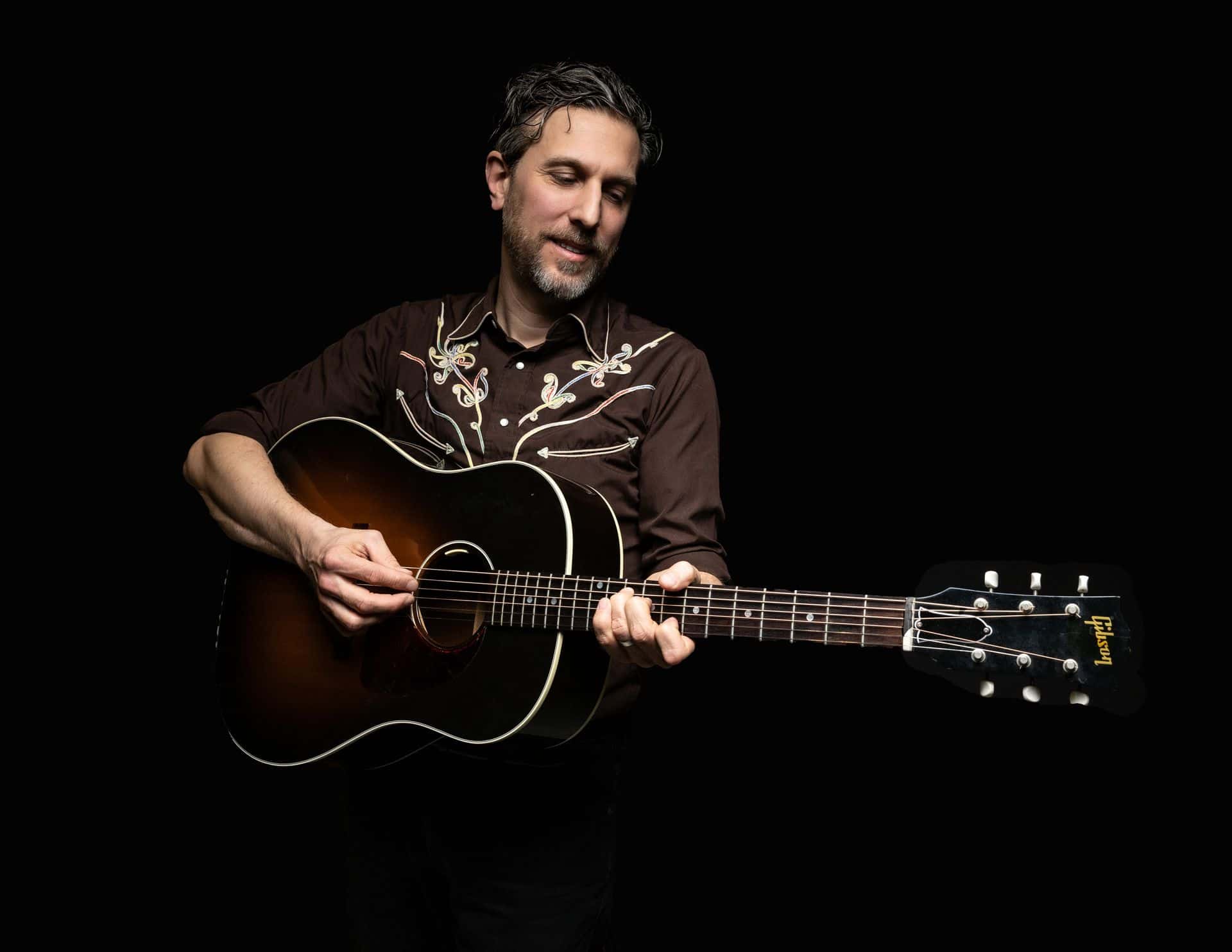 Official promo image of Tony Dekker, lead singer and songwriter of the acclaimed indie-folk band Great Lake Swimmers.