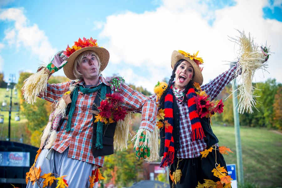 Two performers pose for a shot at Apple Harvest Festival. 