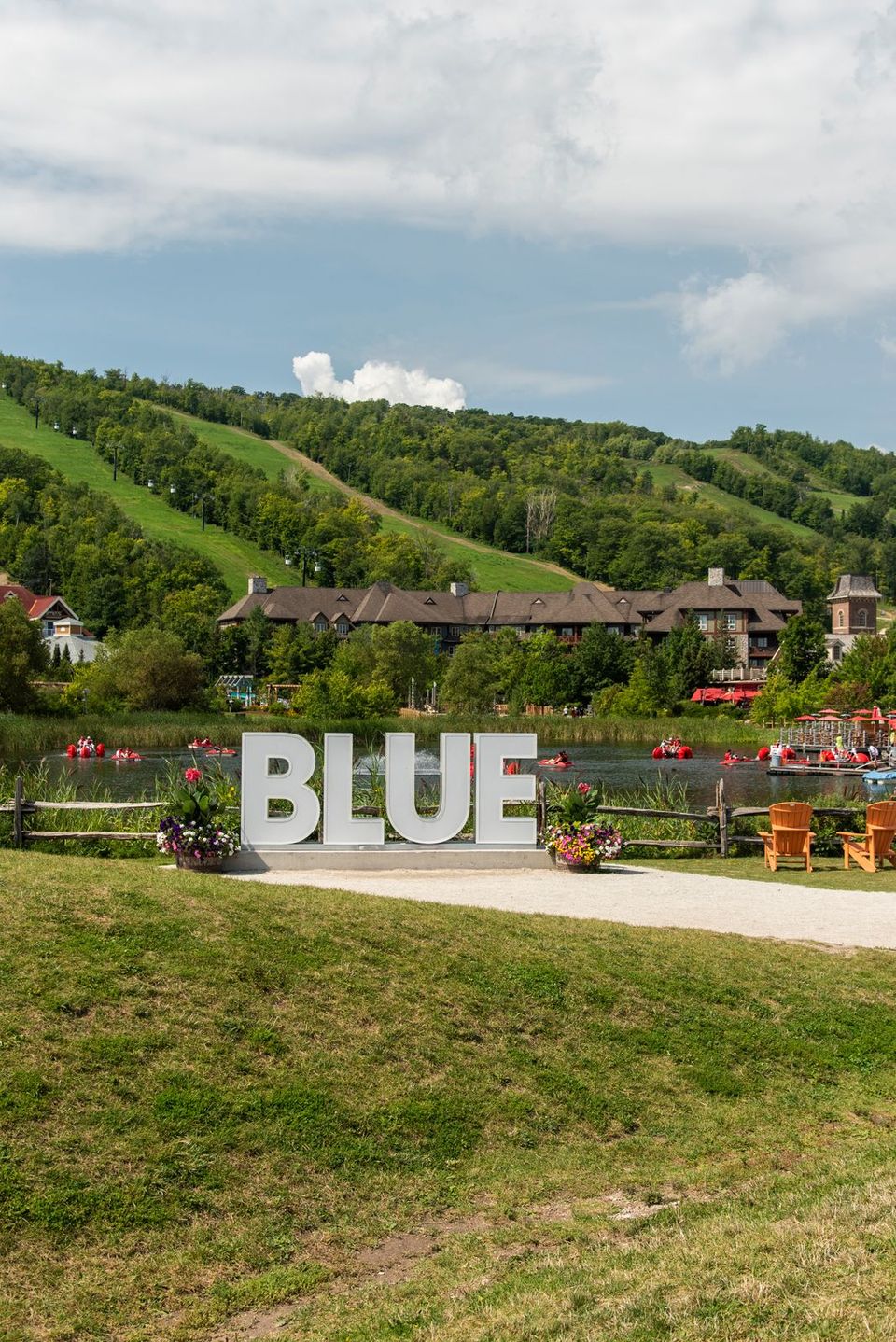 A photo of the iconic Blue sign in the summer.
