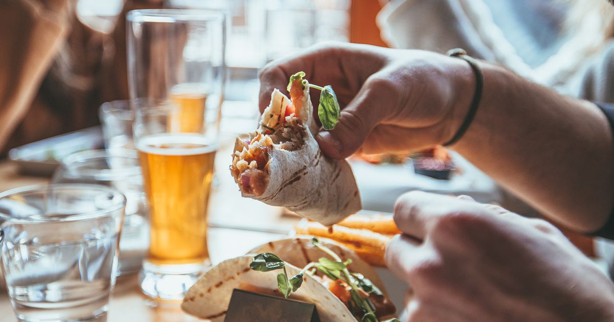 Group of friends dining at Copper Blues Bar & Grill for winter après fun.