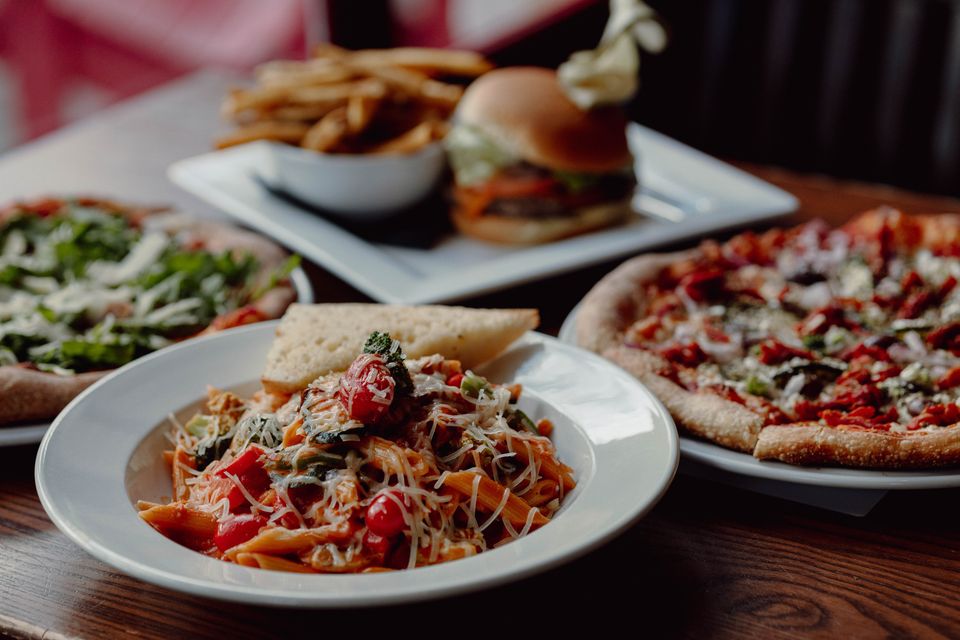 A full spread of signature pizza's, pastas, and handhelds from Firehall Pizza Co. in the Village.
