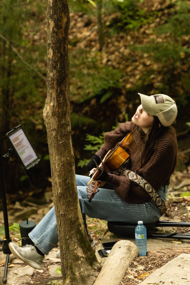 Kendall Lily performing a live acoustic set amongst the trees at one of the Mountain stops along Canada's only Guitar Trail.