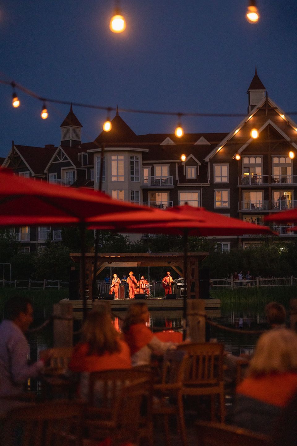 Fantastic view of the live band performing on the Floating Stage from the Kaytoo patio on a warm Summer night!